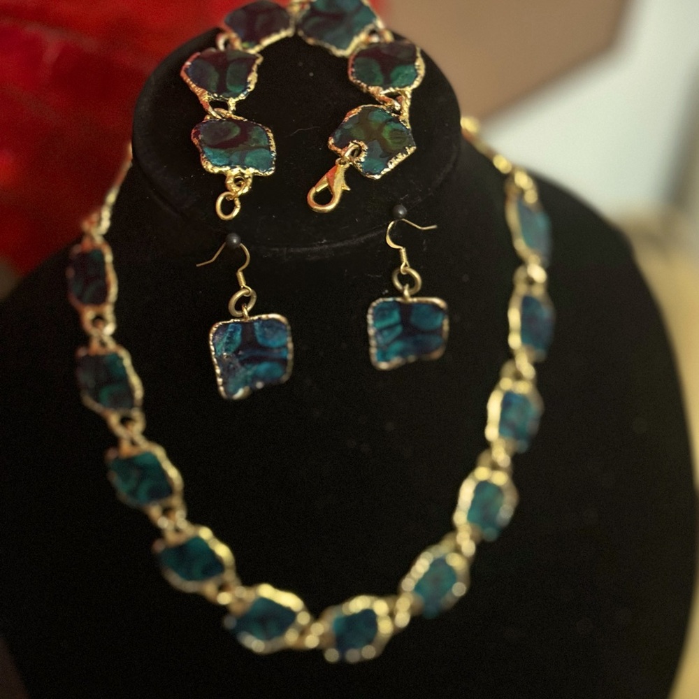 Beautiful, dark green and bright gold necklace, earrings, and bracelet set